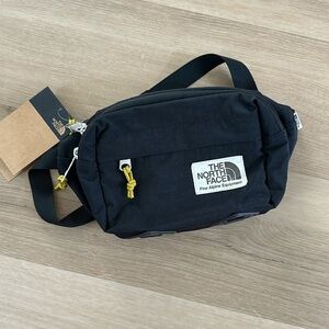 The North Face Berkeley Lumbar Fanny Pack in Black and Marigold